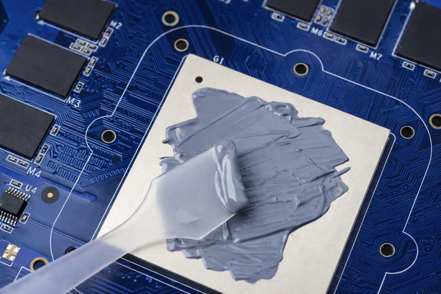 Electronic component assembly with adhesive bond areas
