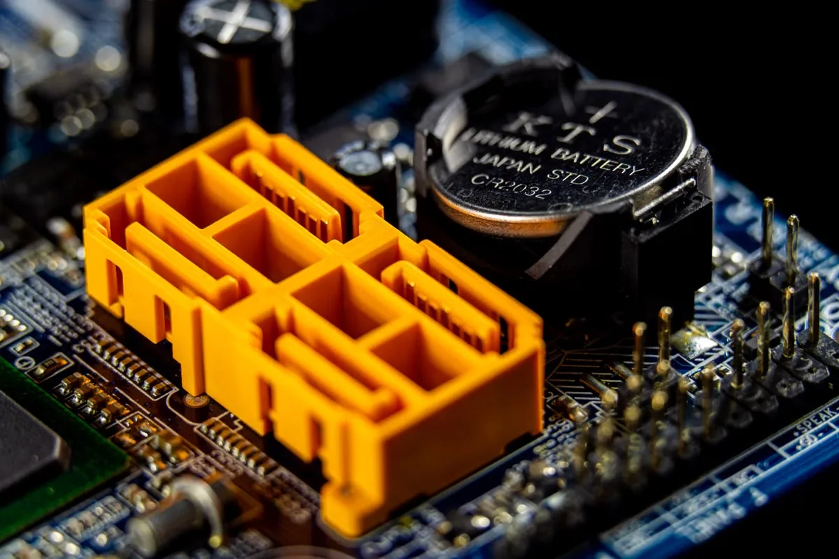 Compact electronic assembly used to define adhesive, coating and thermal material requirements