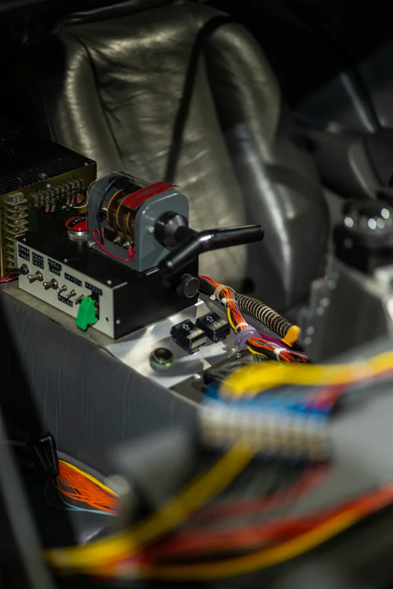 Dense automotive PCB and electronic module requiring coating and encapsulation