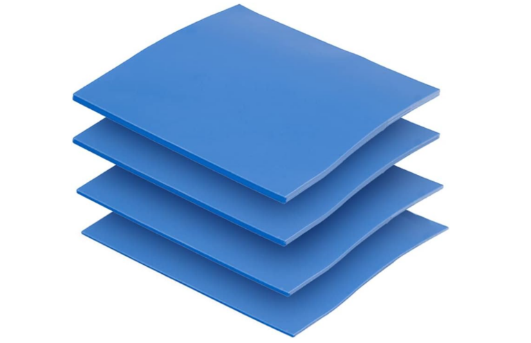 Stacked blue thermal interface material pads for electronic cooling